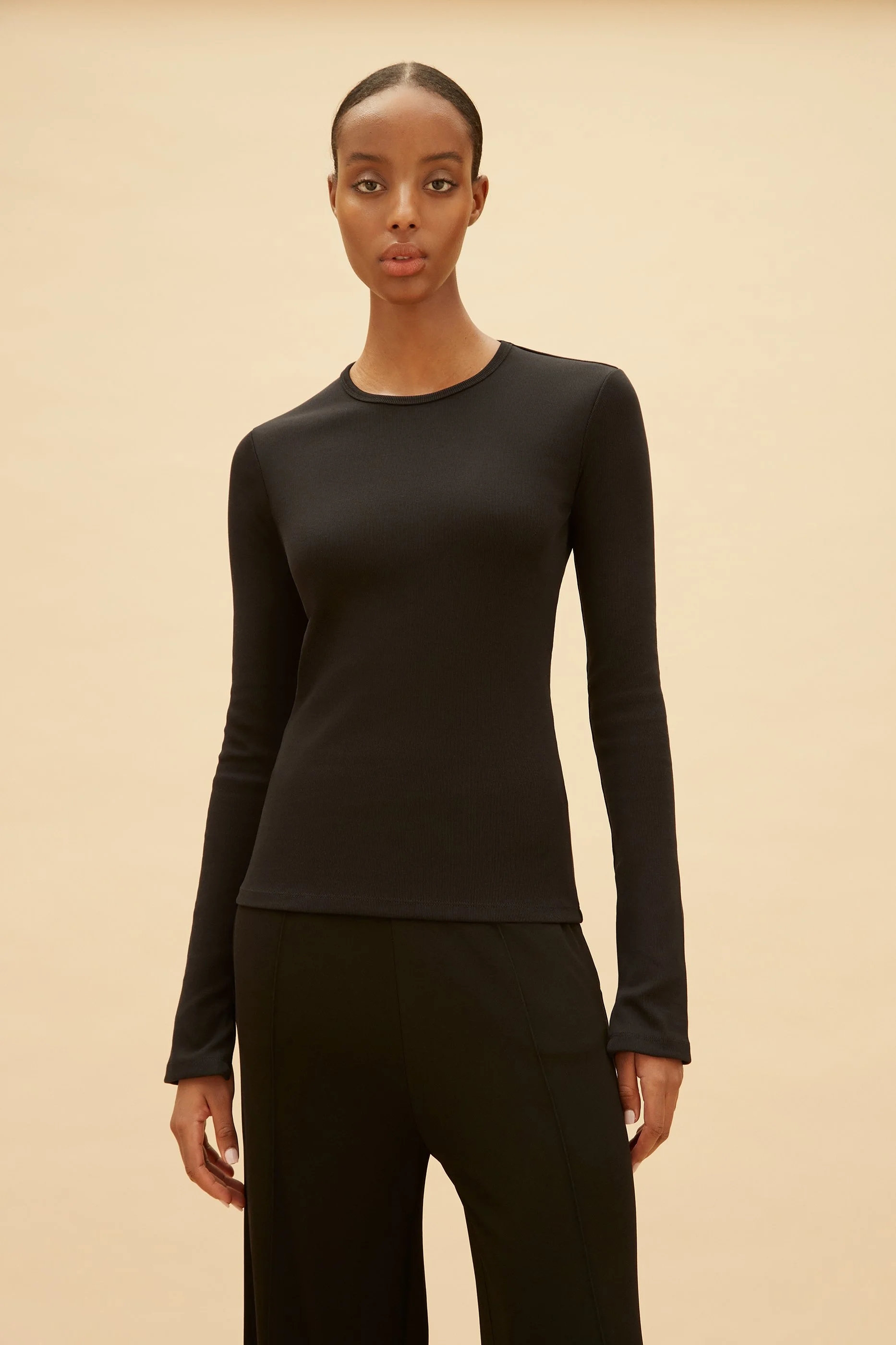 The Iman Longsleeves Jersey Top in Deep Black — REFINE